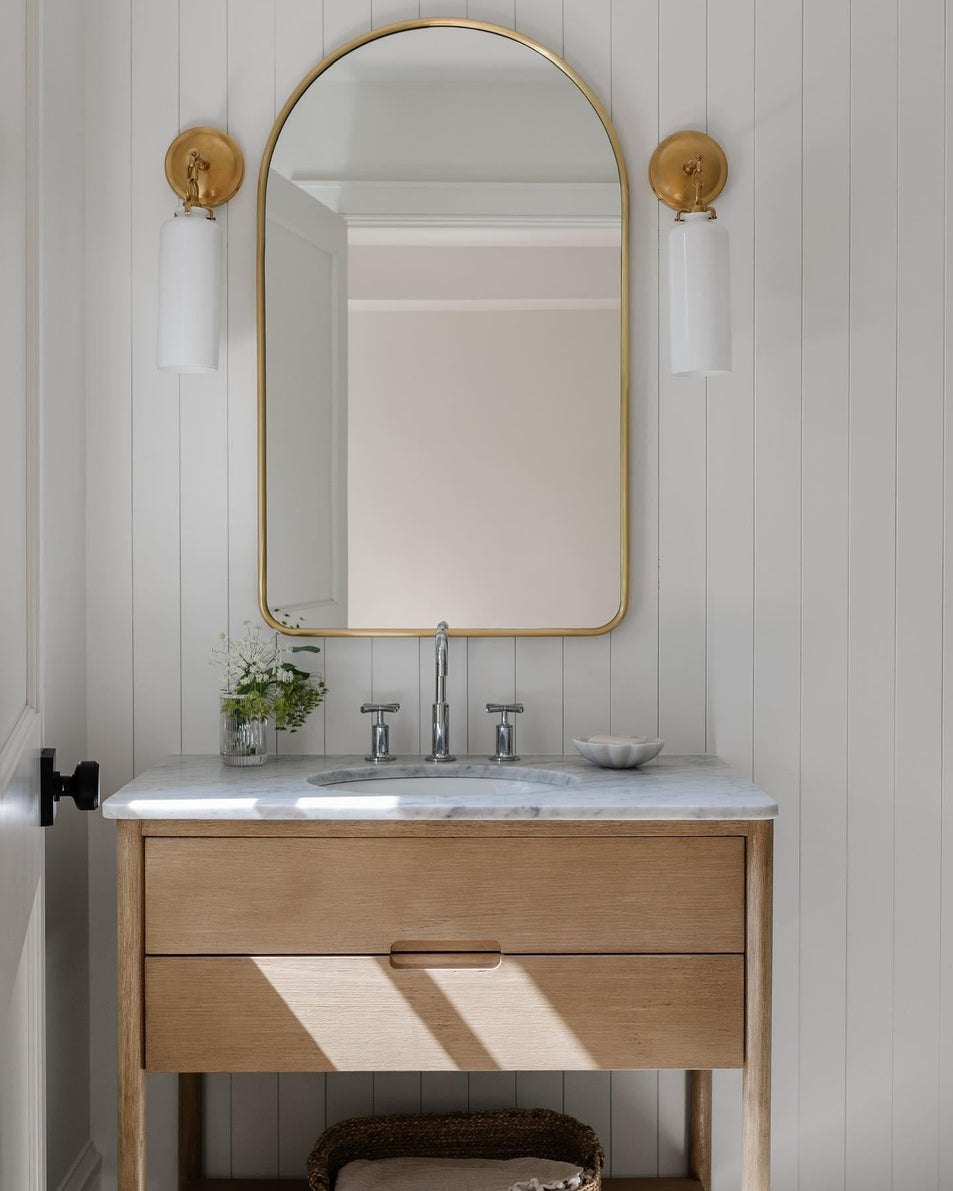 Katie Small Cylinder Sconce, a premium Bath light by Visual Comfort & Co. Close - up image of its design.