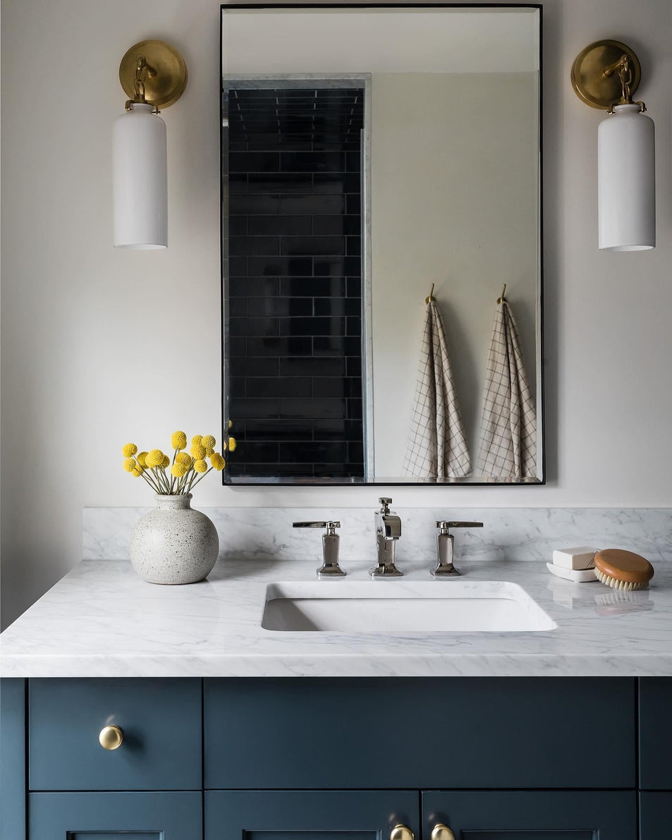 Katie Small Cylinder Sconce, a premium Bath light by Visual Comfort & Co. Close - up image of its design.