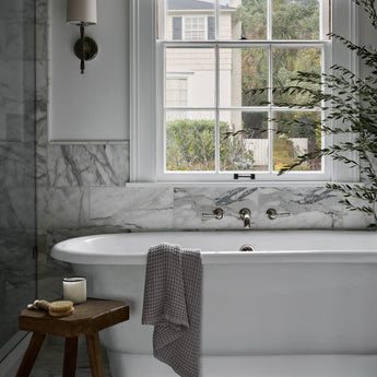 Edie Sconce, a premium Decorative light by Visual Comfort & Co. Close - up image of its design.