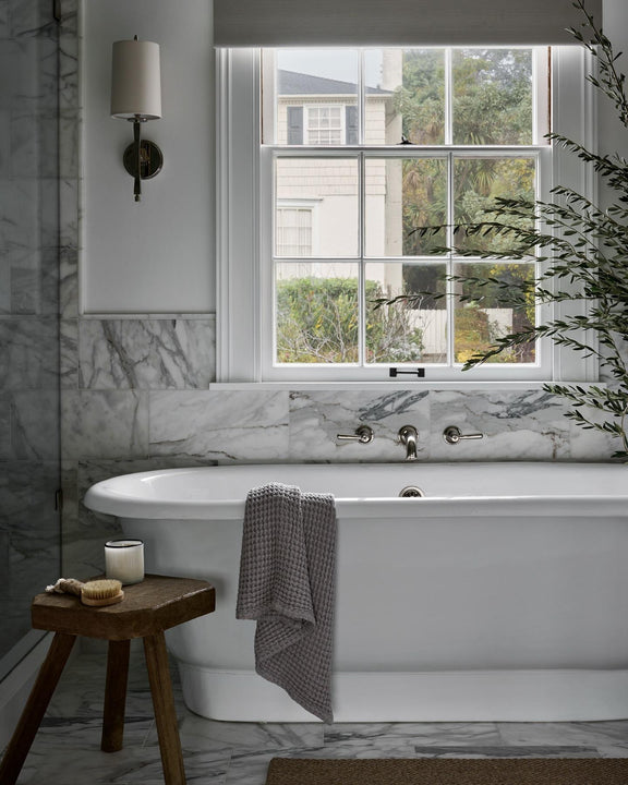 Edie Sconce, a premium Decorative light by Visual Comfort & Co. Close - up image of its design.